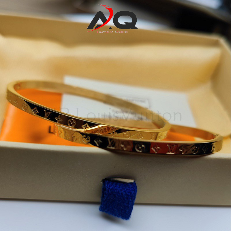 Vòng Tay titan lắc tay LV Kim Loại Khắc Họa Tiết Chữ Louis Vuitton Độc Đáo Thời Trang 2023