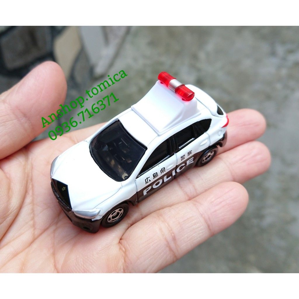 Mô hình xe C. Sát Mazda mở được cốp sau tomica Nhật Bản