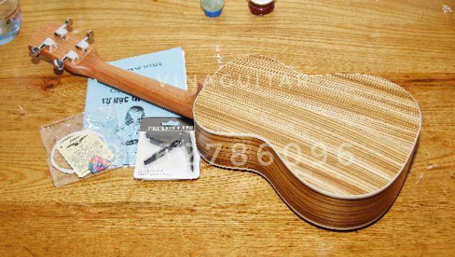 Đàn Ukulele Gỗ Concert/Tenor cao cấp Music Mz9 gỗ zebra