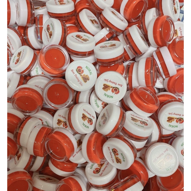 Son Dưỡng Gấc Kích Màu Môi Sau Khi Phun Xăm