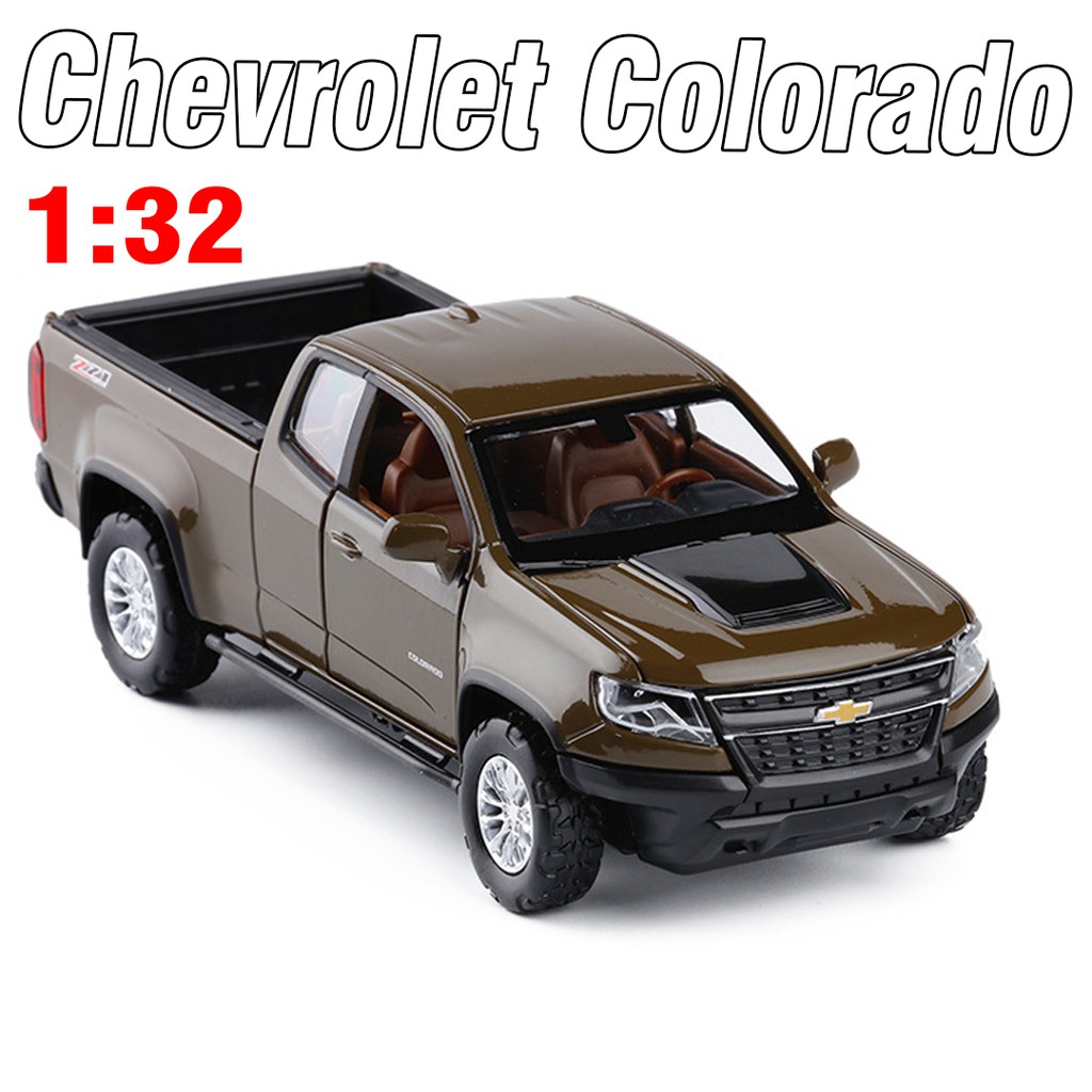 Xe ô tô bán tải Chevrolet colorado tỉ lệ 1:3â Xe bằng sắt mở full cửa chạy cót có đèn và âm thanh