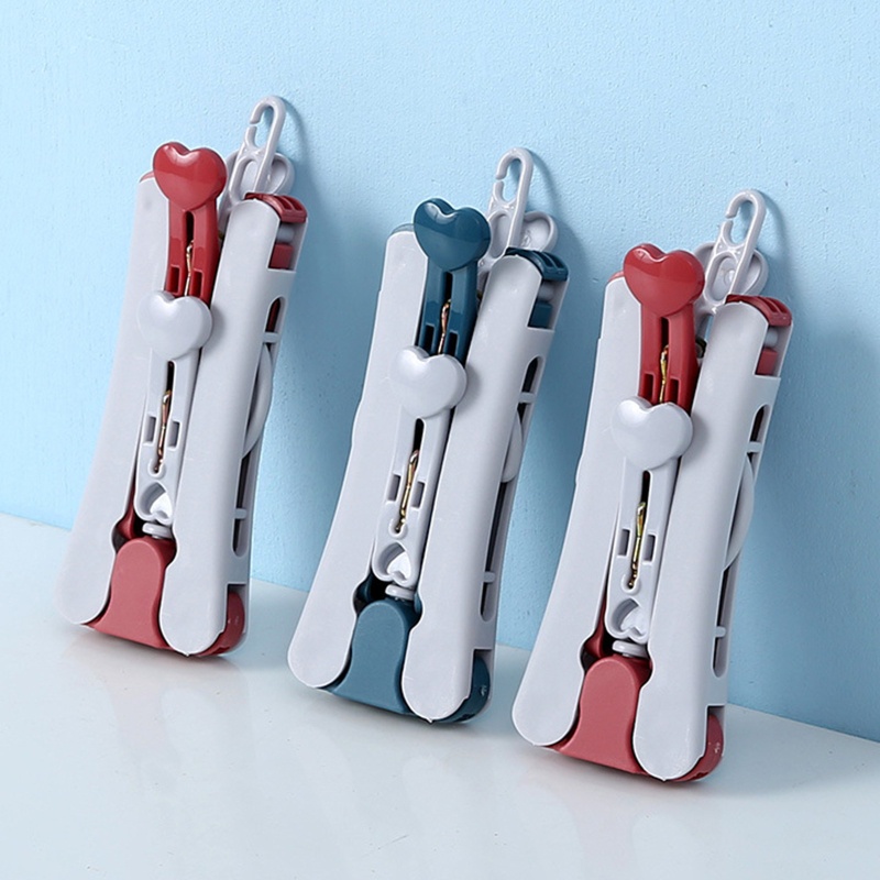 Set 5 Móc Treo Quần Áo Có Thể Xoay Chống Trượt Tiện Lợi