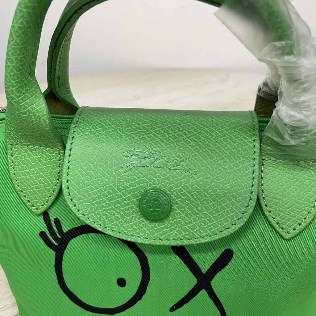 Túi Đeo Chéo Hình Bánh Bao graffiti Nhỏ Gọn Phong Cách Mới Cao Cấp Cho Nữ 77220519 Túi