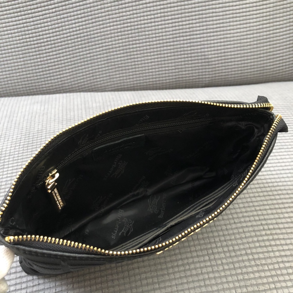 Ví cầm tay nam da thật thời trang cao cấp Burberry BBR phong cách sang trọng, thời thượng