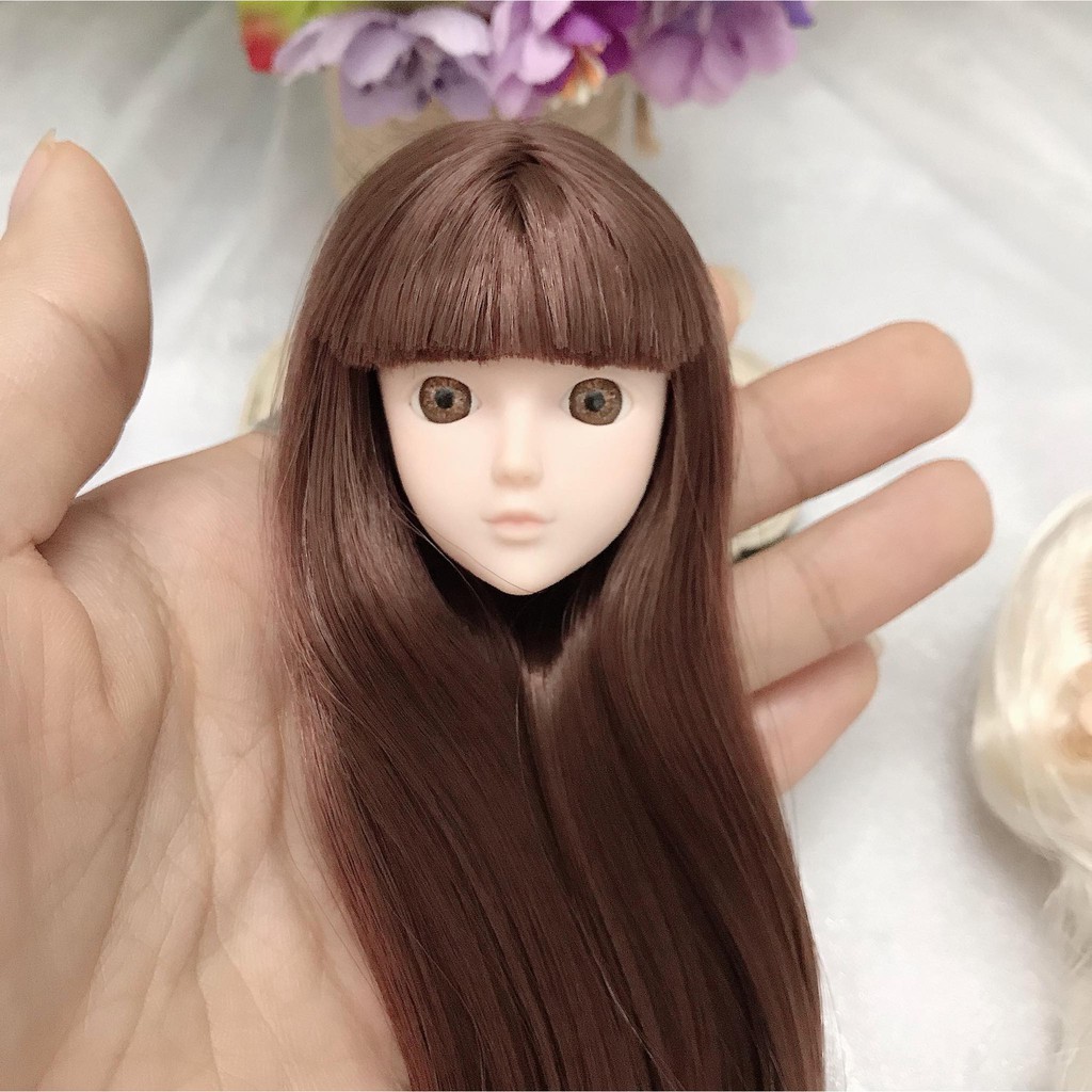 Đầu xinyi mắt gắn chưa faceup có tóc