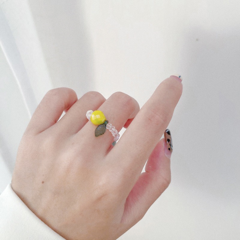 Nhẫn dạng vòng hạt xỏ pha lê trong suốt hình trái cây màu cam đỏ vàng co giãn dành cho nữ