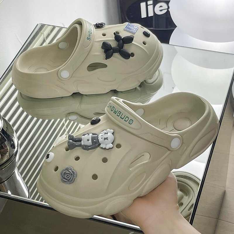Dép Cross nữ Showbudo cao 4cm, Sục nữ độn đế kèm Sticker chất liệu Eva Hottrend 2022