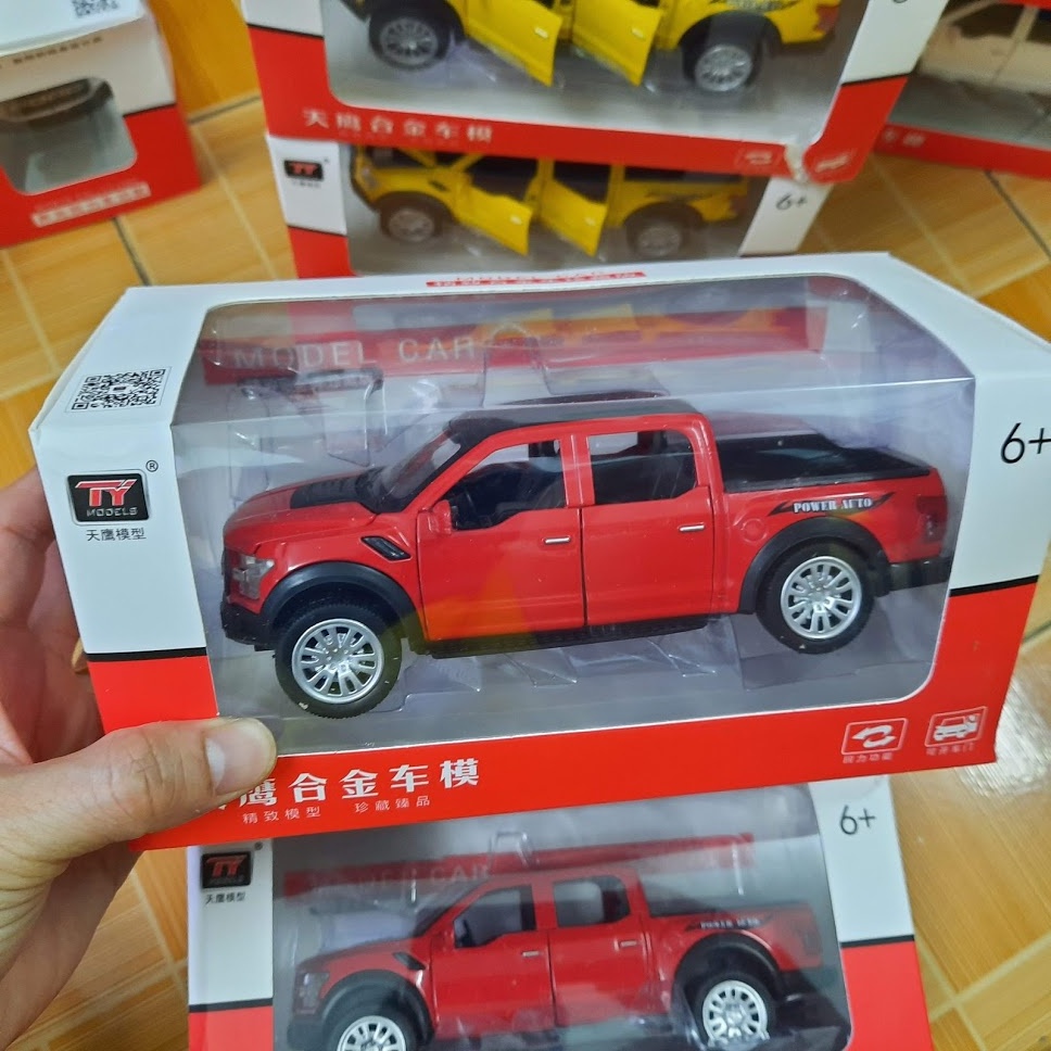 Xe mô hình ô tô Ford Ranger offroad 4x4 đồ chơi trẻ em tỉ lệ 1:32 xe ô tô làm bằng kim loại có đèn và âm thanh