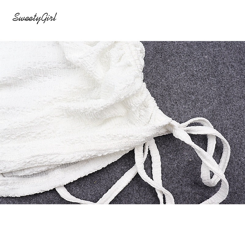 Set áo croptop hở lưng + chân váy ngắn lưng cao màu trơn phối dây rút phong cách gợi cảm cho nữ