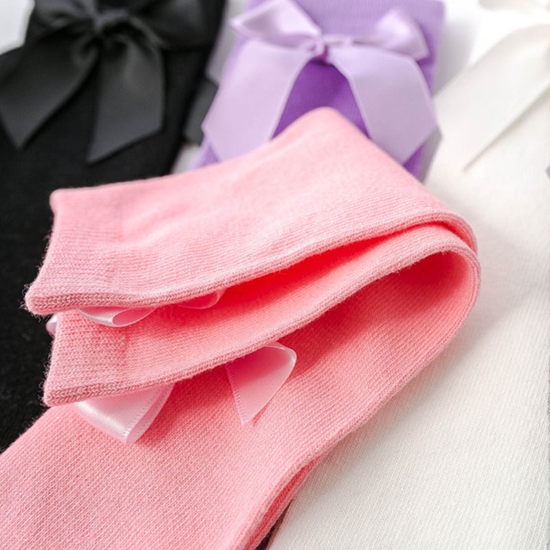 Vớ Cotton Mềm Cổ Cao Qua Gối Màu Trơn Đính Nơ Giữ Ấm Mùa Đông Cho Bé Gái