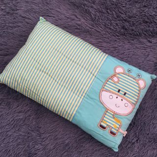 Gối mátxa trẻ em