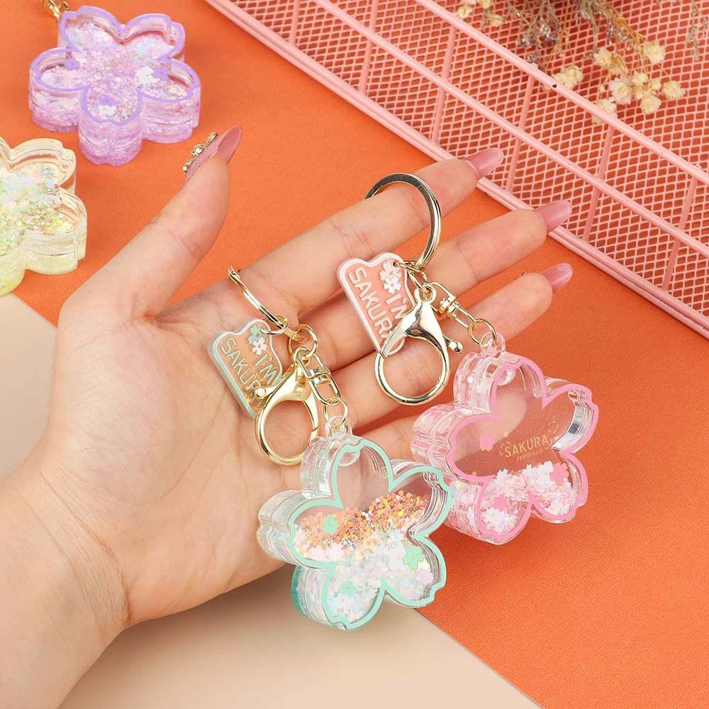 [COD] Móc Khóa Cặp Đôi Hình Bông Tuyết Nổi Trên Mặt Nước Hoa Anh Đào Sáng Tạo Thích Hợp Làm Quà