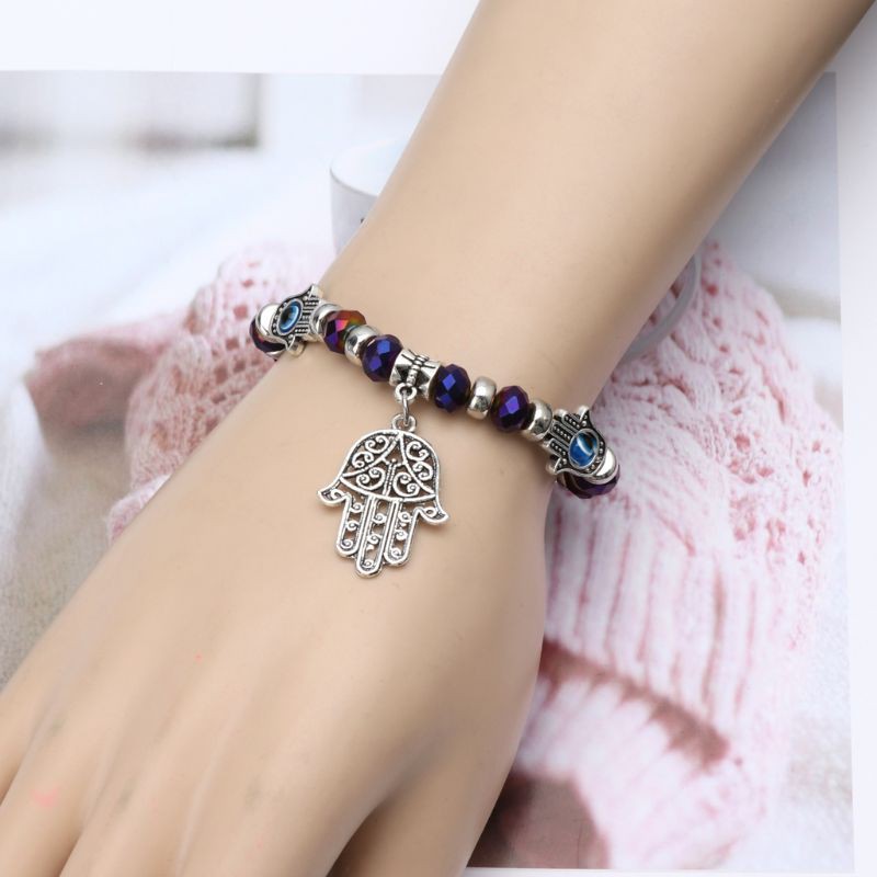 Vòng tay co giãn xanh phối chuỗi hạt hình mắt quỷ độc đáo