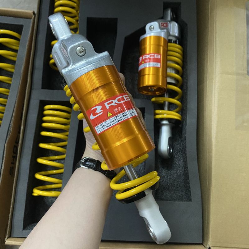 Phuộc nhún sau RCB bình dầu cho các xe Wave Dream Sirius Jupiter Cub chaly Ellegant Axelo Future...