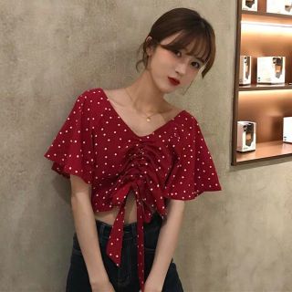 Áo tay bồng chấm bi chun kéo trước ngực