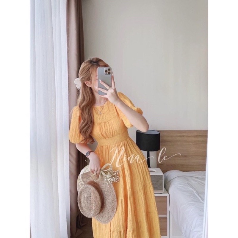 Đầm xốp nhún tay bồng phom xoè