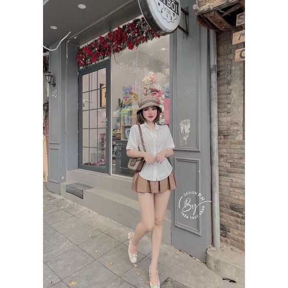 Set áo sơmi + chân váy xếp ly
