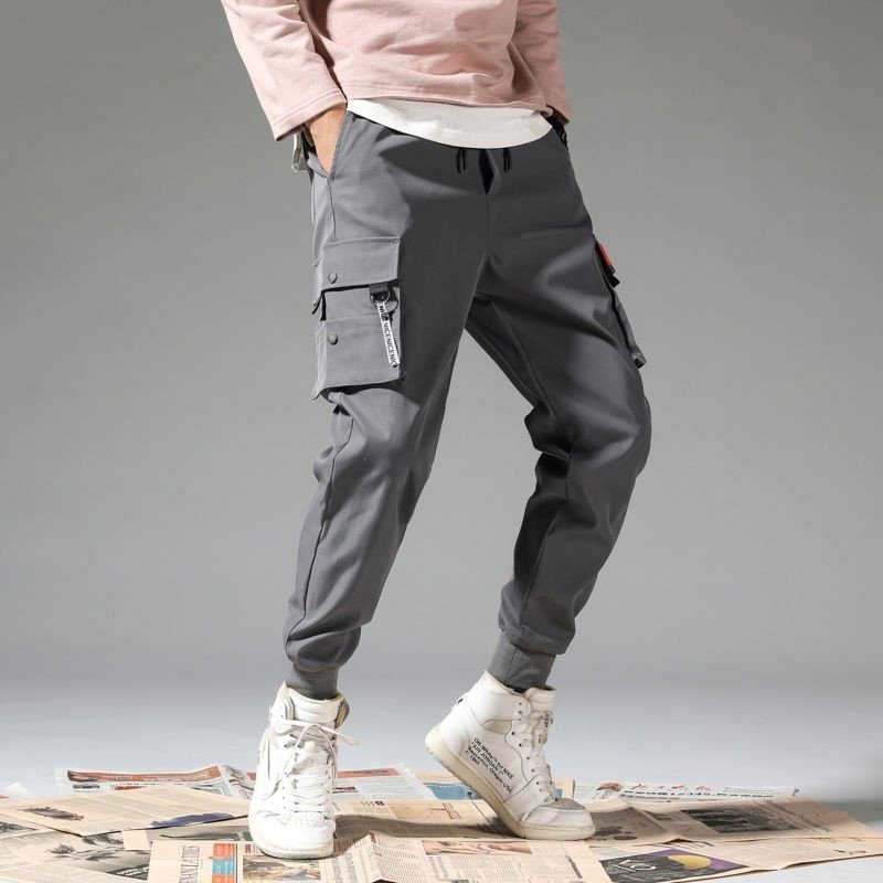 Quần jogger nam Quần thể thao nam vải kaki dài trơn túi hộp bó ống phong cách Hàn Quốc cho mùa hè M01