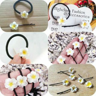 Túi 10 thun cột tóc hoa sứ trắng