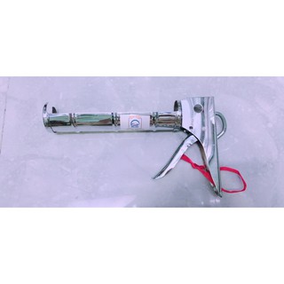 Súng bắn keo silicon máng có cắt inox