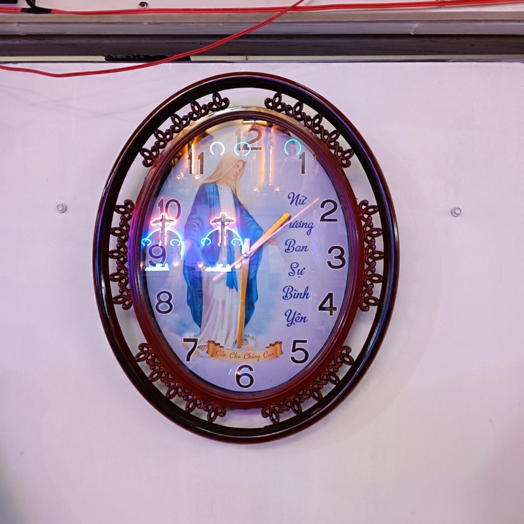 Đồng hồ treo tường oval có in hình size 45x35 đồng hồ trang trí quà tặng công giáo