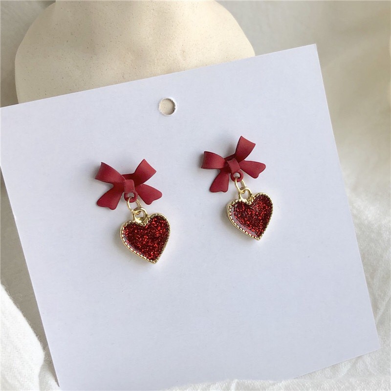 Bông tai nữ trái tim nơ k551 mayconner
