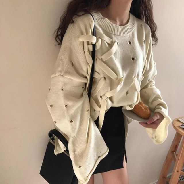 Áo len oversize đan dây thiết kế lạ