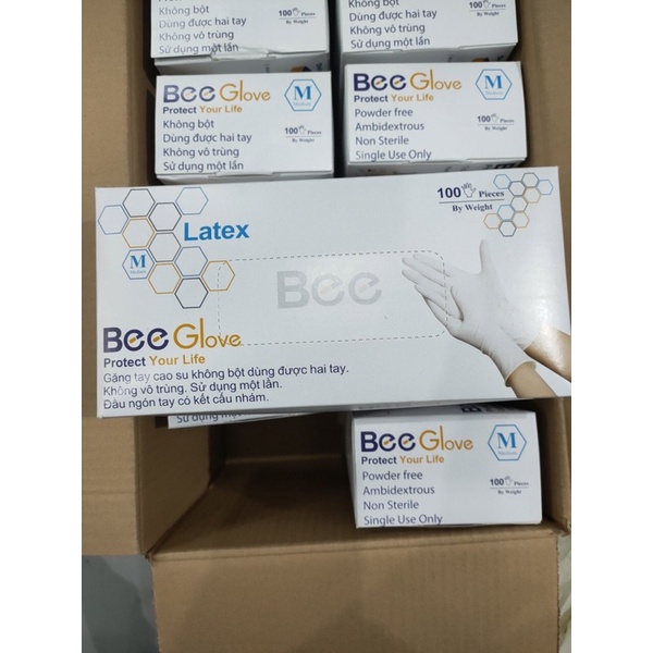 hợp 100 cai găng tay y tế latex không bột , bee glove, màu trắng kem