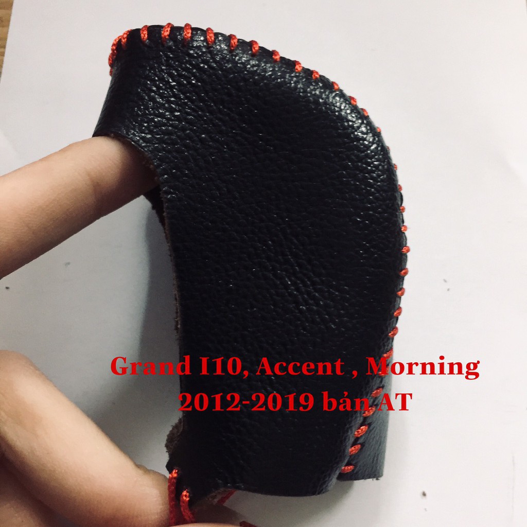 Bọc cần số+ tay phanh da thật xe Huyndai Accent , Grand I10 bản AT- chỉ đỏ.