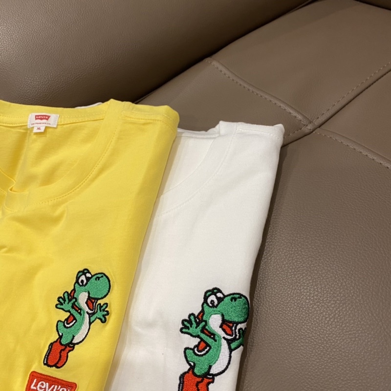 Áo phông thêu hình khủng long