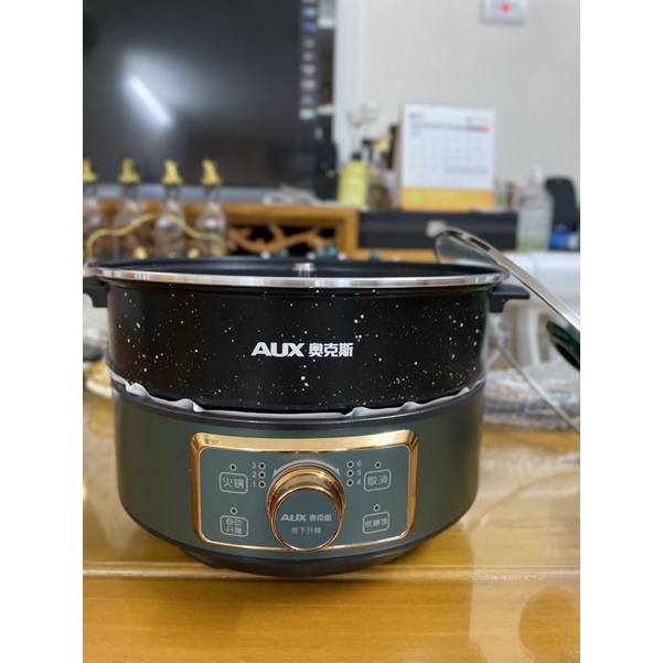 Lẩu thang máy chính hãng AUX