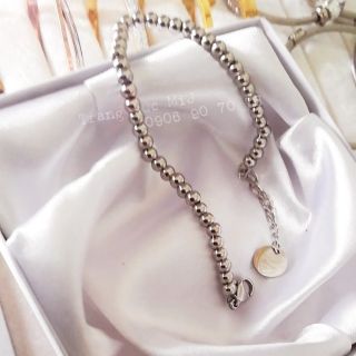 Lắc tay titan bi trắng