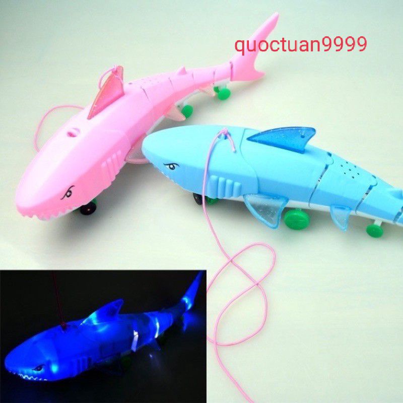 Đồ chơi con cá mập bò phát nhạc và đèn cho trẻ em