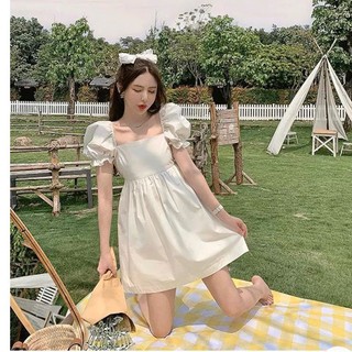 Đầm trắng tay phồng cột nơ sau