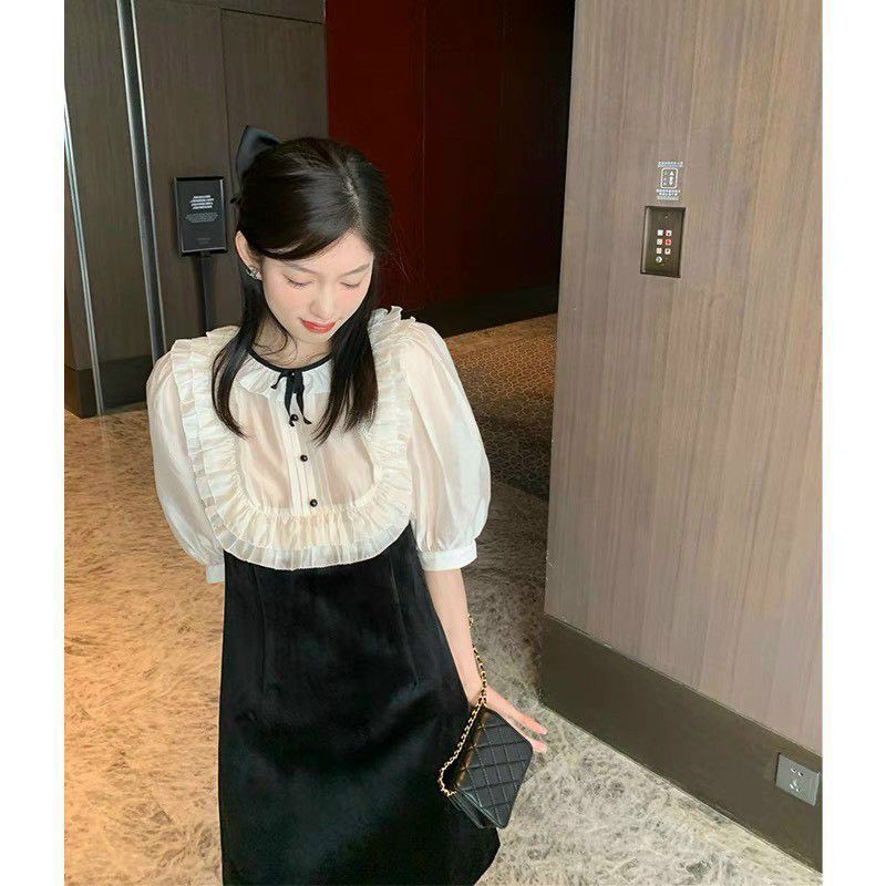 Đầm đen phối trắng cổ bèo nơ thắt