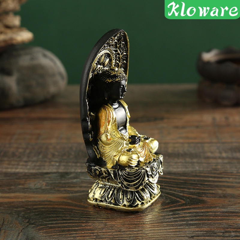 Tượng phật màu vàng và đen dùng để trang trí