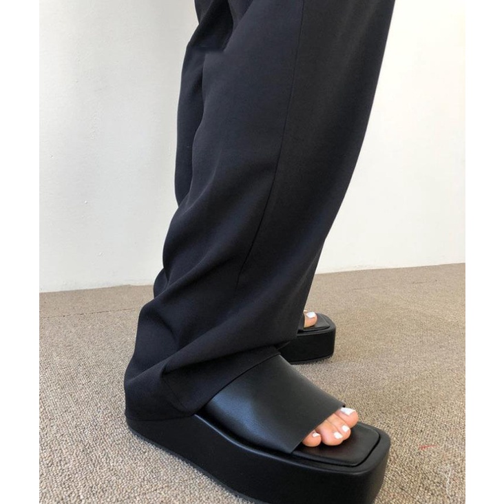 Black wedge platform flip-flops