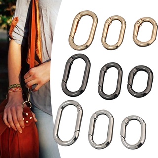 Móc khóa túi xách da đính vòng tròn mở thời trang