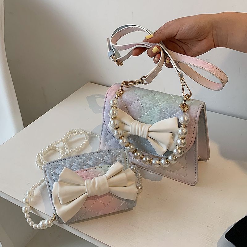 Túi xách đeo chéo mini phối dây ngọc đính nơ dễ thương hai size to và nhỏ có ảnh thật