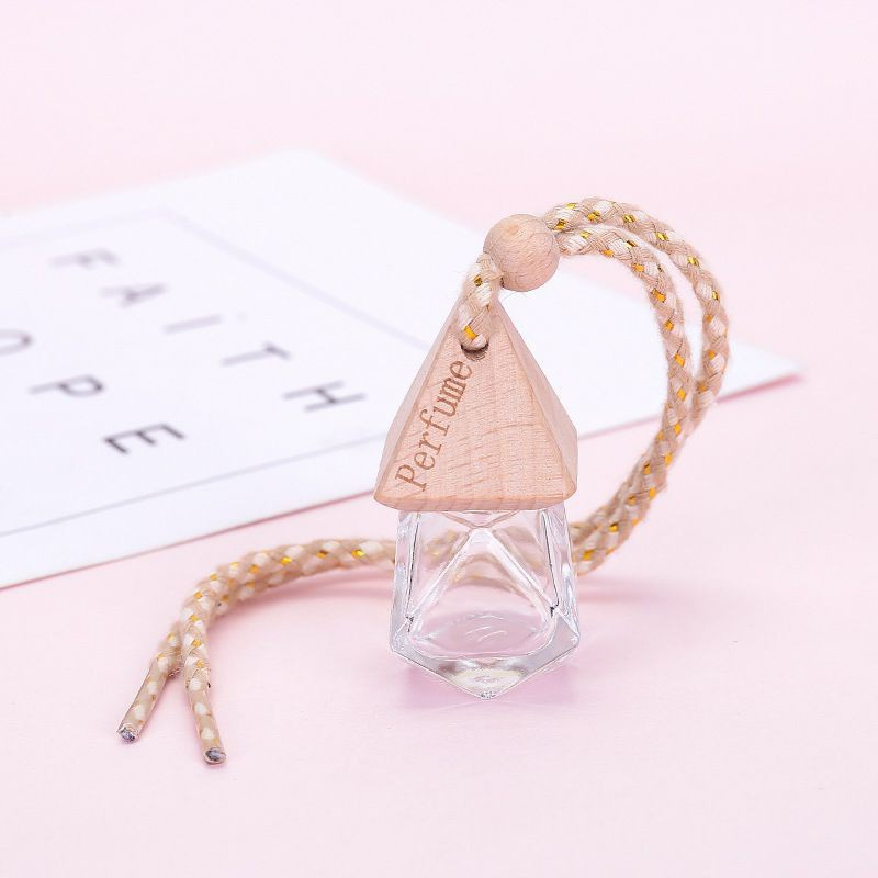 [GIÁ RẺ NHẤT] Vỏ lọ đựng tinh dầu treo xe có Logo chiết nước hoa , phụ kiện du lịch