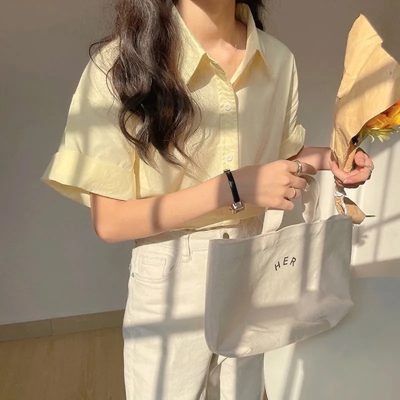 Áo Sơ Mi Ngắn Tay Màu Vàng Nhạt Thiết Kế Mới Thời Trang Mùa Hè Theo Phong Cách Pháp Cho Nữ