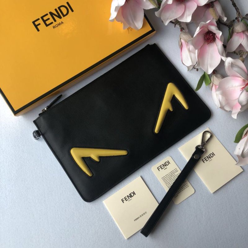 clutch cầm tay nam da thật dáng dài kéo khóa có quai cầm tay họa tiết hình đôi mắt màu vàng Fendi FD