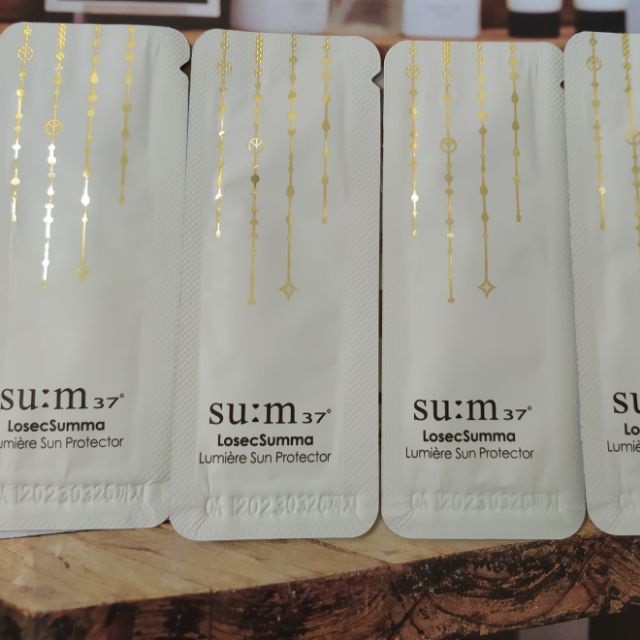 Combo 10 gói kem chống nắng tinh chất vàng Sum Losec Summa Lumiere Sun protector 1ml x 10