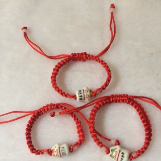 Vòng tay dây rút đỏ kết mèo sứ thần tài may mắn