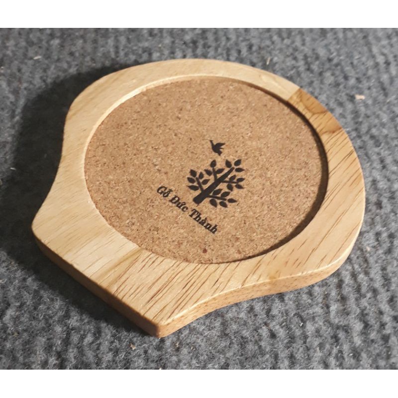 Miếng lót ly hình vỏ sò bằng gỗ màu tự nhiên