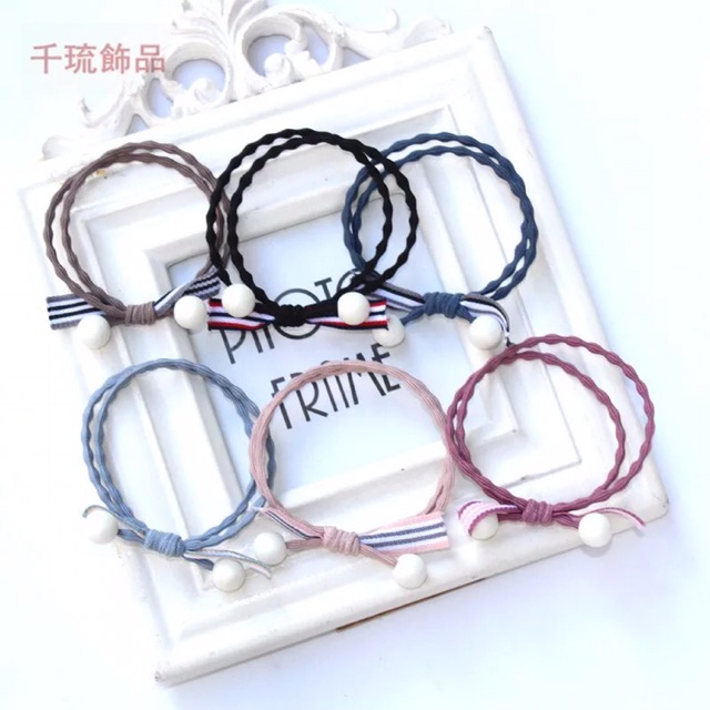 Sỉ 10 buộc tóc hình nơ kẻ tua hàn quốc  53k