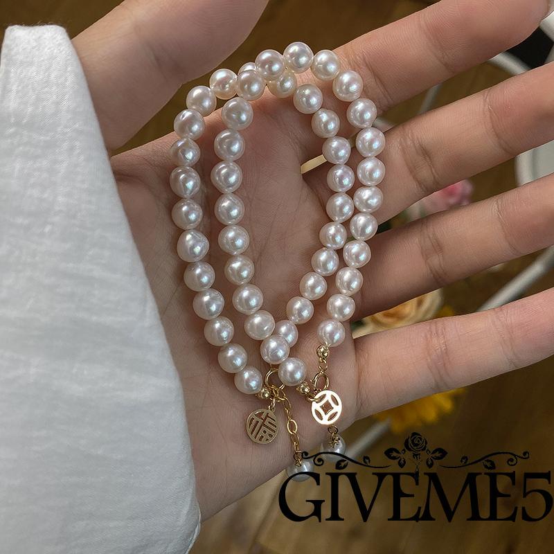 Vòng tay may mắn đính ngọc trai giả thời trang cho nữ