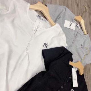 Áo phông cúc cài cổ túi zip