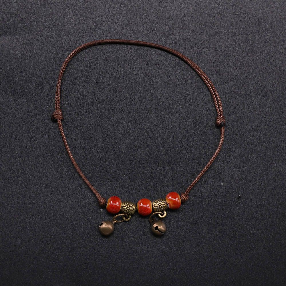 Lắc chân phối hạt chuông mini kiểu thổ cẩm dễ thương cho nữ