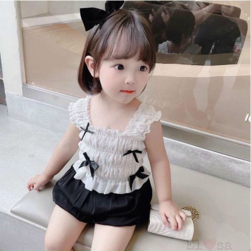Bộ quần áo bé gái kiểu áo nhún đính nơ quần bí dễ thương chất lụa mềm mát cho bé 1 đến 5 tuổi Nhã Uyên Kids mã BK034